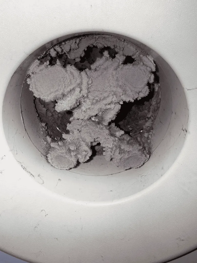dust buildup on exhaused fan that caused weak airflow