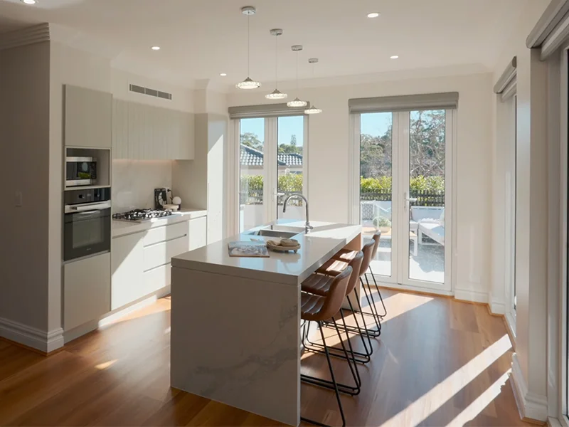 Built-in electric oven integrated into modern kitchen cabinetry at Centennial Avenue, Chatswood
