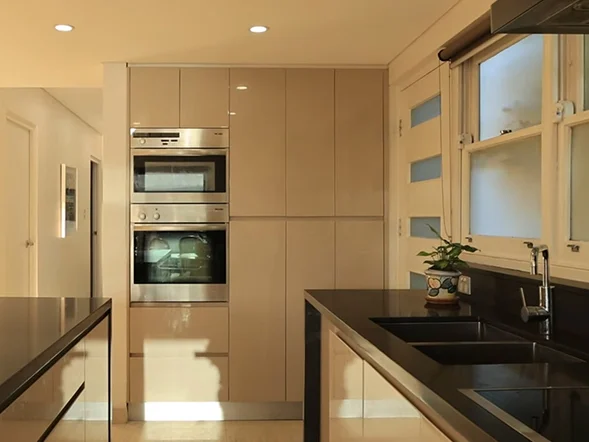 Built in electric oven installation in modern kitchen at Bay Parade, Malabar