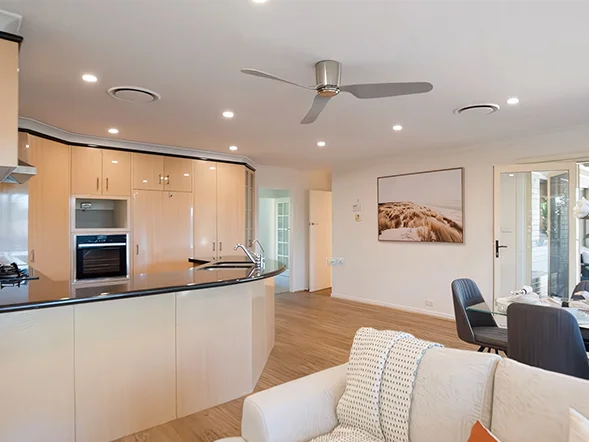 Ceiling fan installation in open plan kitchen and dining area at Hilda Road, Baulkham Hills
