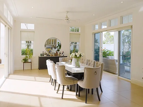 Ceiling fan installation in bright open plan dining area with recessed lighting at Peninsula Drive, Breakfast Point