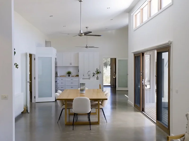Modern ceiling fan installation in high-ceiling dining and kitchen area at Janvrin Road, St Leonards