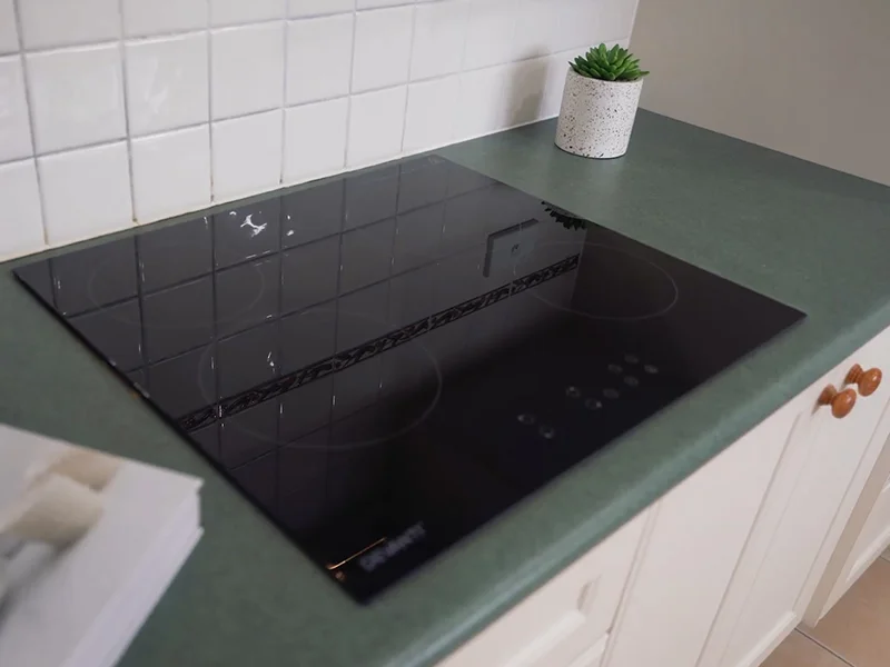 Electric induction cooktop installation on kitchen benchtop at Brushwood Place, Hornsby