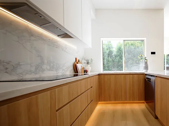 Under-cabinet LED strip lighting installed along the splashback at Wongajong Close, Castle Hill