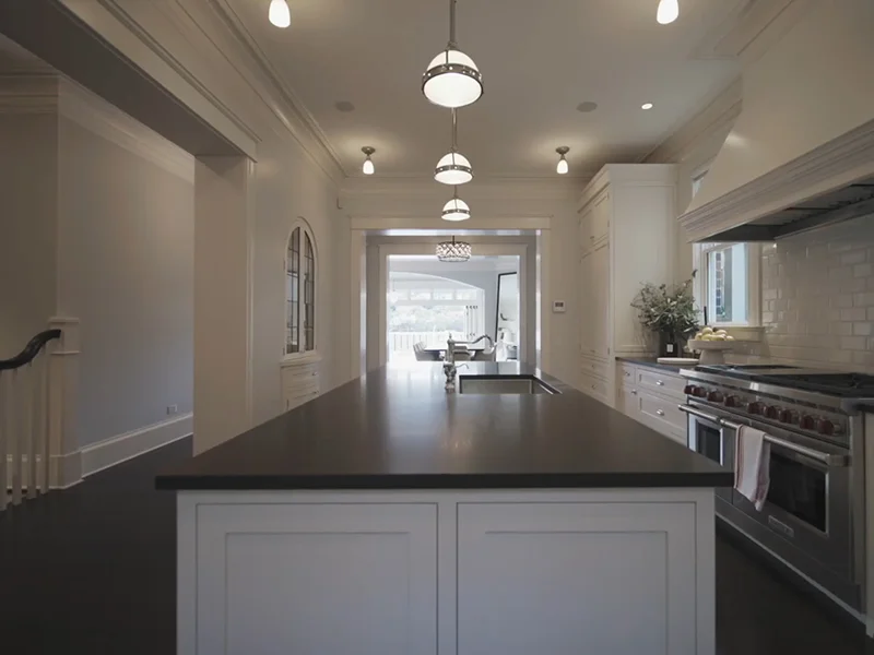 Pendant and ceiling light installation in classic kitchen with island bench in Mosman, North Shore