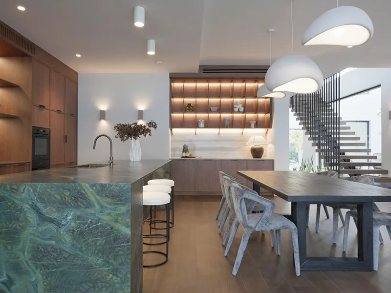 Modern pendant and recessed lighting installation in luxury kitchen and dining area at Highfield Road, Lindfield