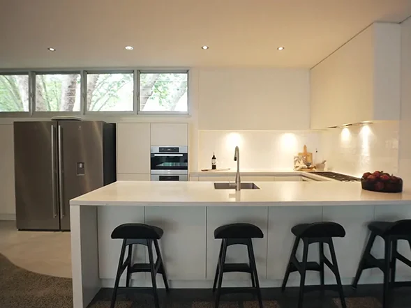 Recessed ceiling downlight installation in modern open plan kitchen at Roylston Street, Paddington