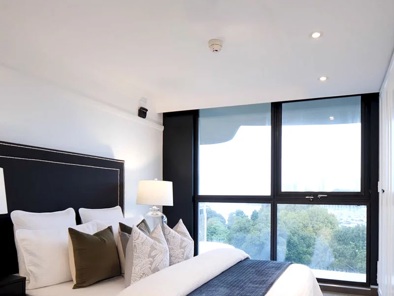 Smoke alarm installation on bedroom ceiling at Bayswater Road, Rushcutters Bay