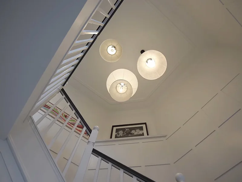 Pendant stairwell lighting installation in stairway void at Narani Crescent, Northbridge