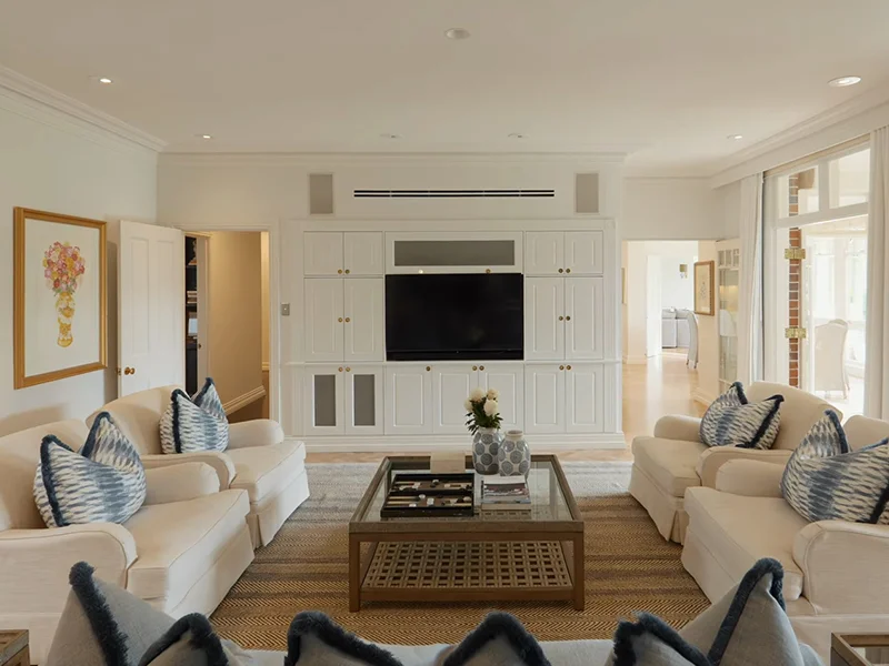Wall-mounted television installation in modern living room at Karranga Avenue, Killara