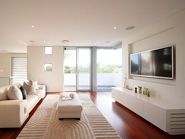 Wall mounted television installation in modern living area at De Villiers Rise, Bella Vista
