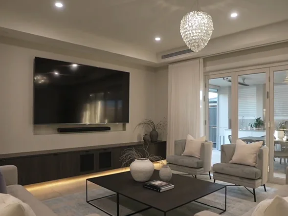 Wall mounted television installation in modern living room at Bruhn Circuit, Kellyville