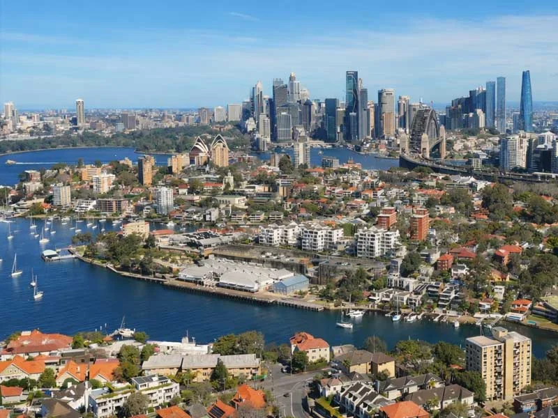 Aerial view of Sydney North Shore homes and the Harbour Bridge, a primary service area for Calibre Connect electricians
