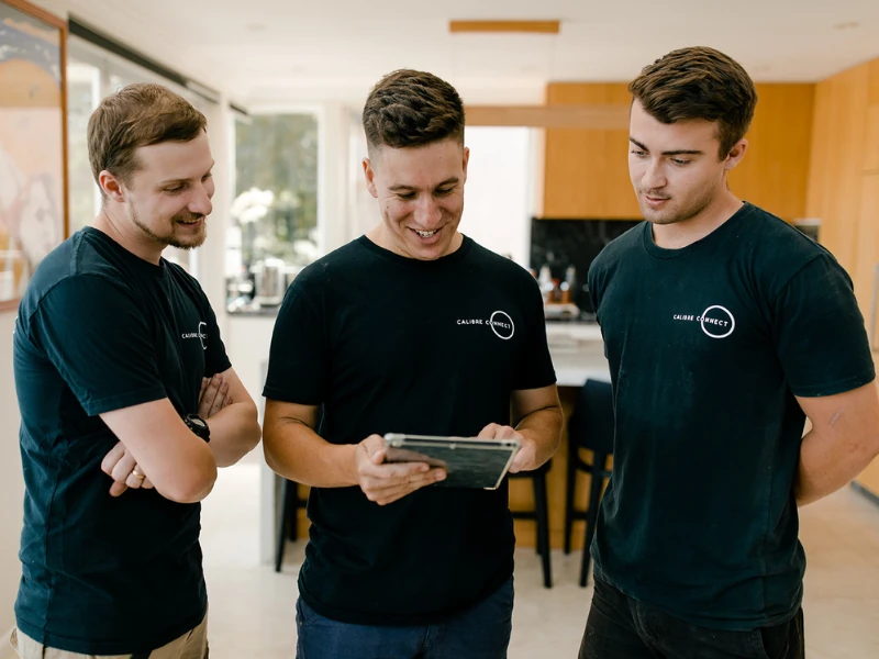 Licensed Level 2 electricians from Calibre Connect carrying out metering work at a Sydney property