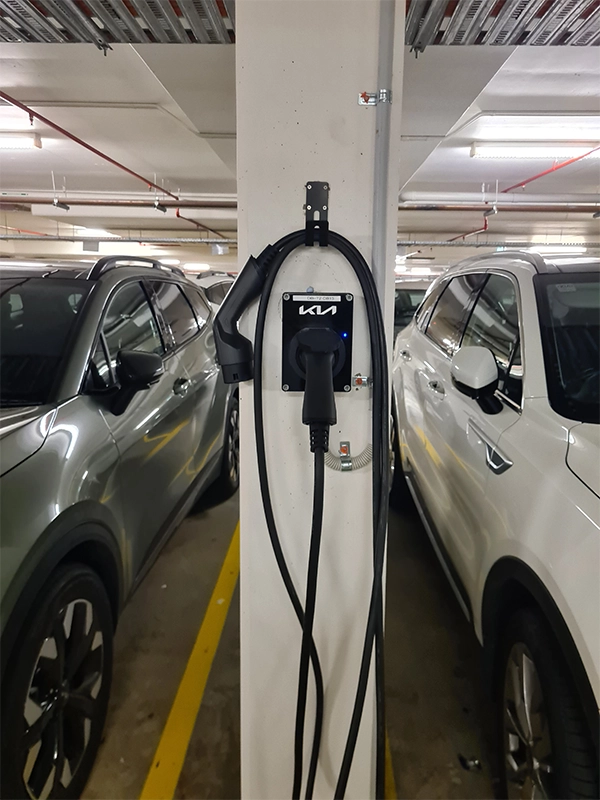Commercial EV charger installed on a car park pillar as part of the EV charging installation process in Sydney
