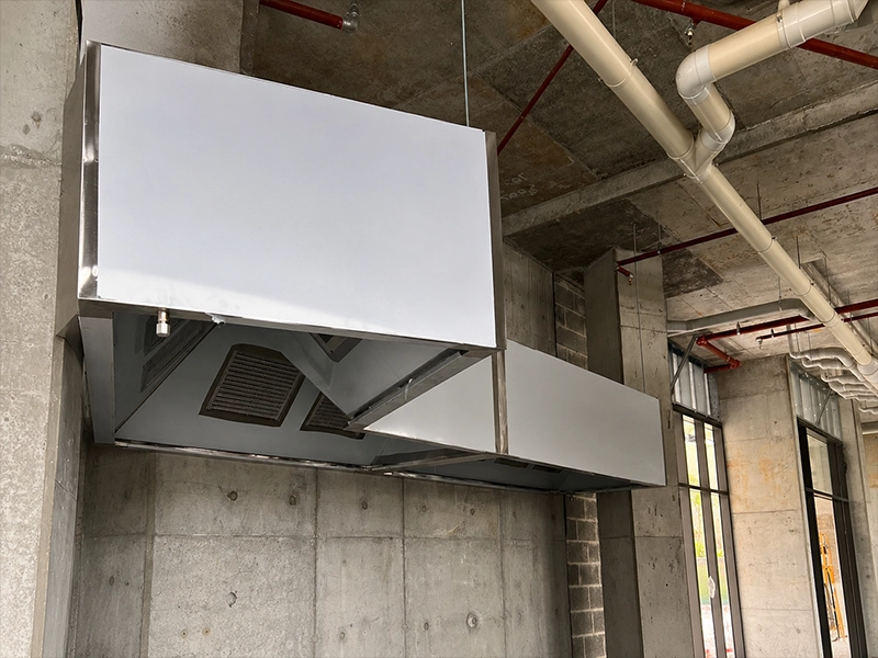 Commercial exhaust fan and ducting installed in a Sydney building for mechanical ventilation
