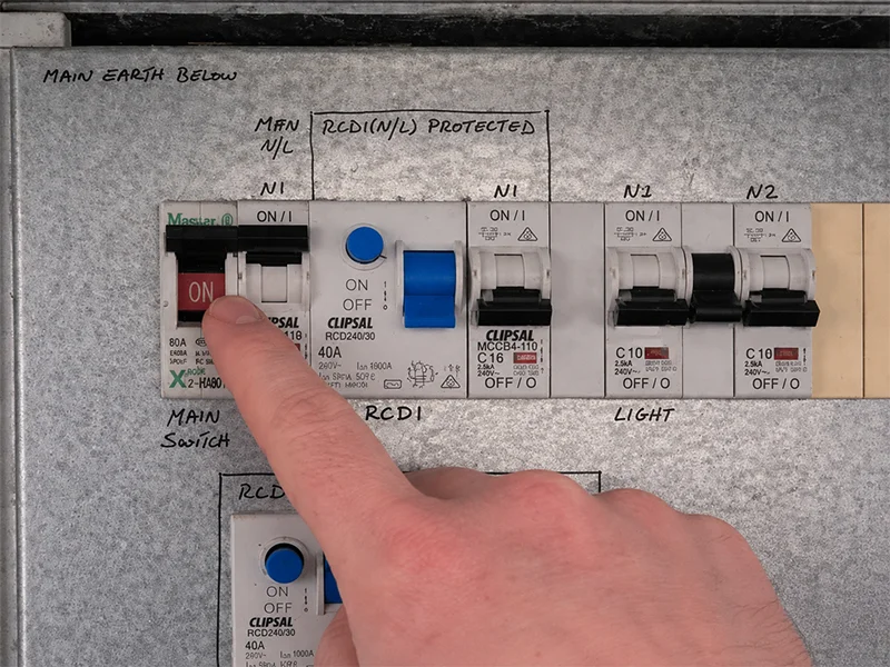 Turning off the main switch on a Sydney switchboard during an electrical emergency