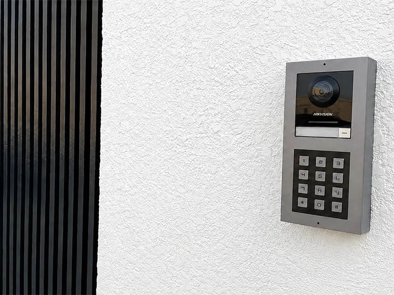 Residential video intercom with keypad installed on a Sydney home exterior wall