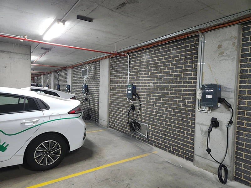 Calibre Connect EV chargers installed in a Sydney strata apartment car park for shared residential charging