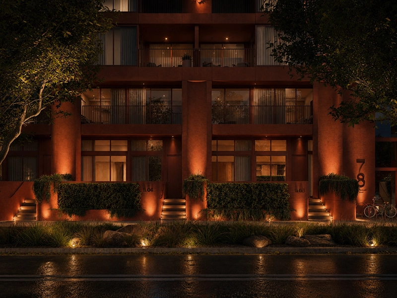 Strata common-property lighting installed around a Sydney apartment building exterior