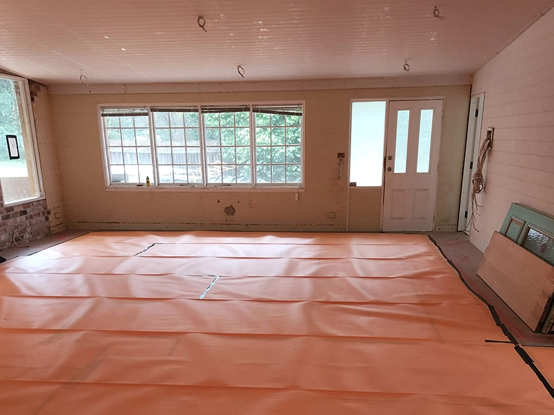 Electric underfloor heating installed beneath a tiled living area in a Sydney home